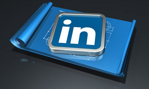 3d illustration of a large metallic LinkedIn logo lying on top of an unrolled set of blueprints over a dark reflective surface